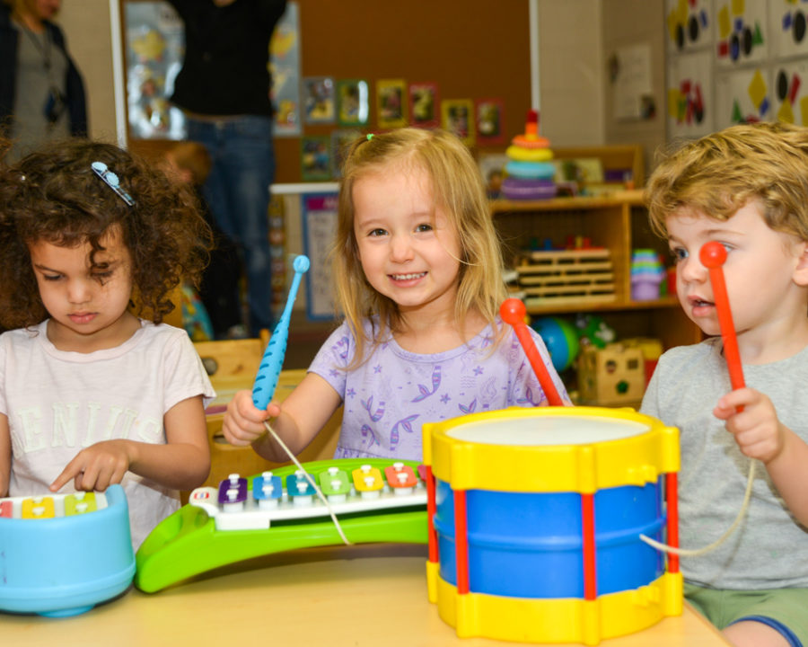 Preschools kids playing with toy instruments