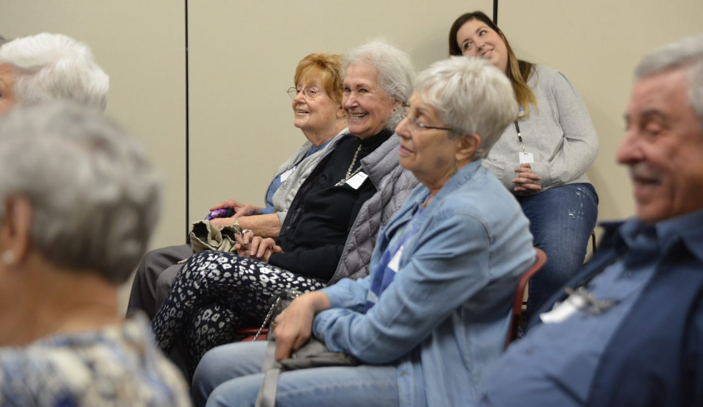 Seniors listening at a discussion group
