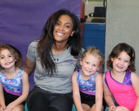 staff and youth at gymnastics