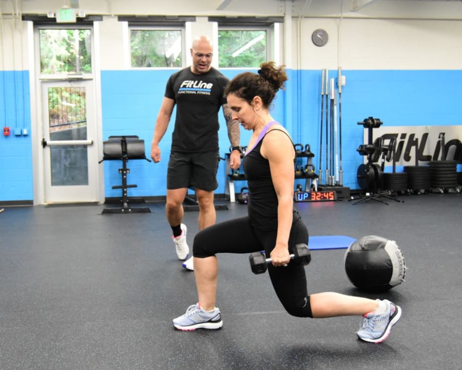 Instructor and student in a Ultimate Fitness Classes