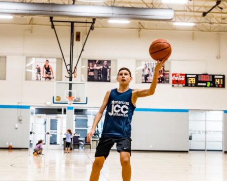 Youth shooting a basketball