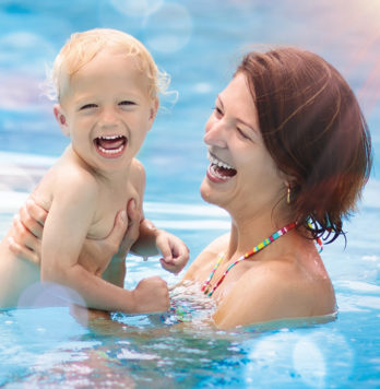 mom and son in the pool